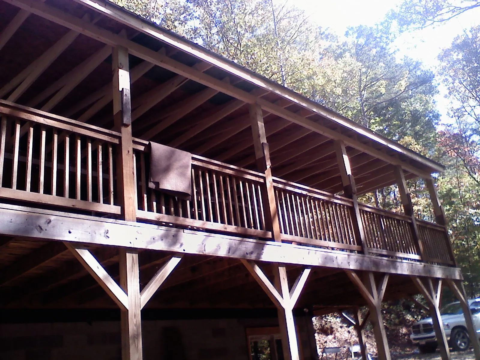 Timber framing under a new elevated porch and deck — Roof Leak Repair in Beverly Hills by Roofing Brothers